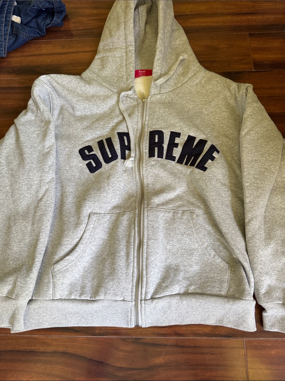 Supreme Gray Zip-Up Hoodie with Navy Arch Logo